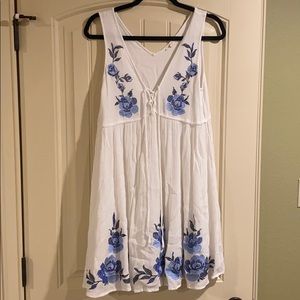 White dress with floral design